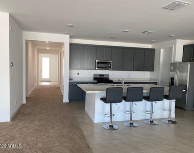 17356 W Sutherland Way - Photo Thumbnail 2