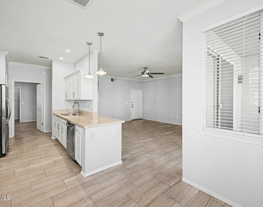 7009 E Acoma Drive - Photo Thumbnail 1