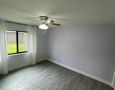 10053 Winding Lake Road - Photo Thumbnail 17