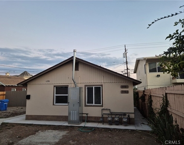 118 1/2 Fano Street - Photo Thumbnail 1