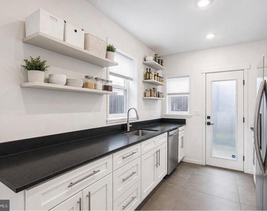 1249 N Hollywood Street - Photo Thumbnail 3