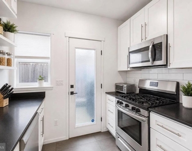 1249 N Hollywood Street - Photo Thumbnail 2