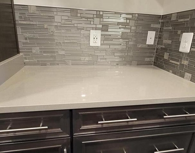4940 Macdonough Pl - Photo Thumbnail 2
