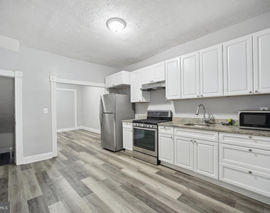 1524 E 28th Street E - Photo Thumbnail 2