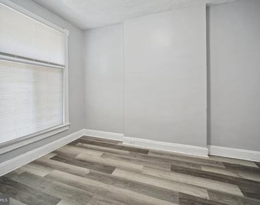 1524 E 28th Street E - Photo Thumbnail 4
