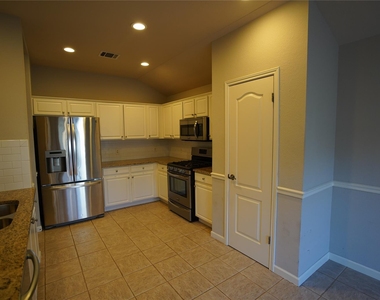 5702 Fitchwood Ln - Photo Thumbnail 6