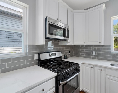 1102 Woodland Ave - Photo Thumbnail 7