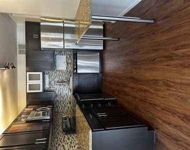 860 N Dewitt Place - Photo Thumbnail 1