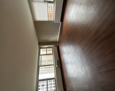 860 N Dewitt Place - Photo Thumbnail 2