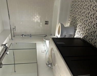 860 N Dewitt Place - Photo Thumbnail 6