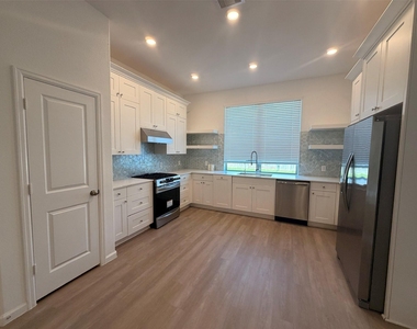 4922 Sand Clouds Drive - Photo Thumbnail 3