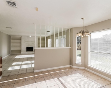 7447 Woodland West Drive - Photo Thumbnail 2