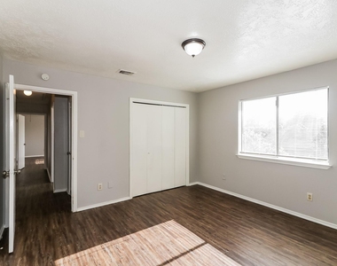 7447 Woodland West Drive - Photo Thumbnail 11
