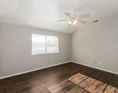 7447 Woodland West Drive - Photo Thumbnail 10