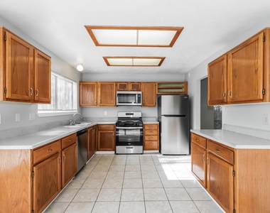7447 Woodland West Drive - Photo Thumbnail 8