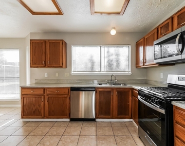 7447 Woodland West Drive - Photo Thumbnail 9