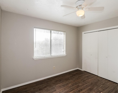 7447 Woodland West Drive - Photo Thumbnail 5
