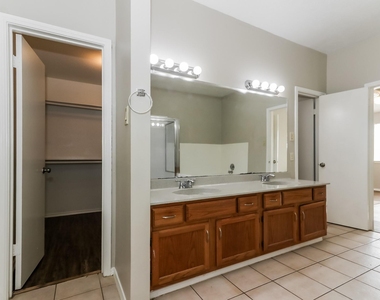 7447 Woodland West Drive - Photo Thumbnail 14