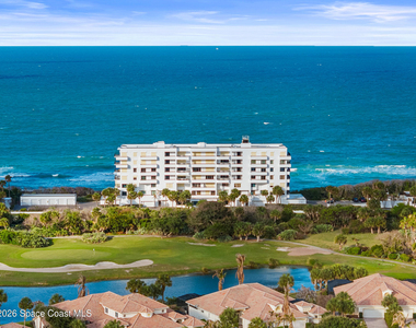 7415 Aquarina Beach Drive - Photo Thumbnail 70