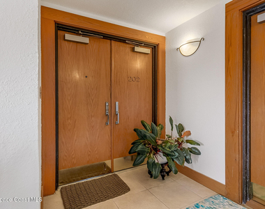 7415 Aquarina Beach Drive - Photo Thumbnail 3