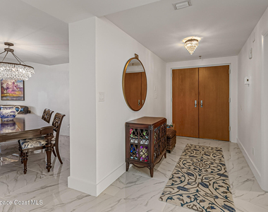 7415 Aquarina Beach Drive - Photo Thumbnail 4