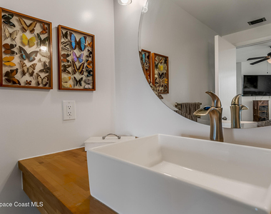 7415 Aquarina Beach Drive - Photo Thumbnail 47