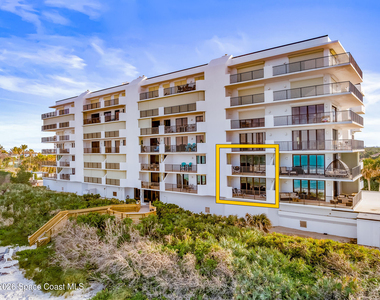 7415 Aquarina Beach Drive - Photo Thumbnail 1