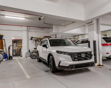 7415 Aquarina Beach Drive - Photo Thumbnail 54