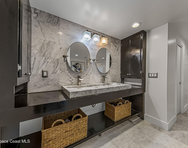 7415 Aquarina Beach Drive - Photo Thumbnail 34