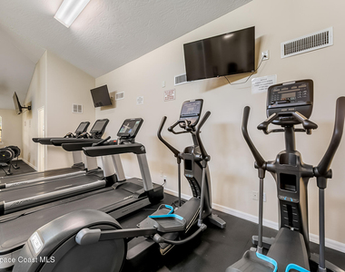 7415 Aquarina Beach Drive - Photo Thumbnail 65
