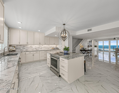 7415 Aquarina Beach Drive - Photo Thumbnail 18