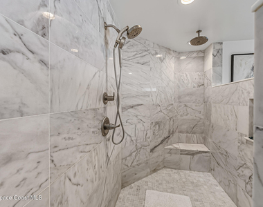 7415 Aquarina Beach Drive - Photo Thumbnail 36
