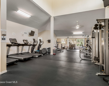 7415 Aquarina Beach Drive - Photo Thumbnail 63