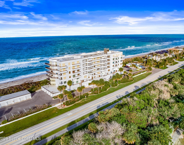 7415 Aquarina Beach Drive - Photo Thumbnail 68