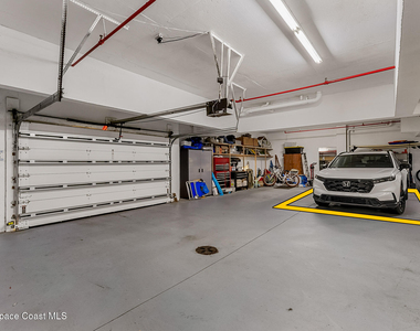7415 Aquarina Beach Drive - Photo Thumbnail 52