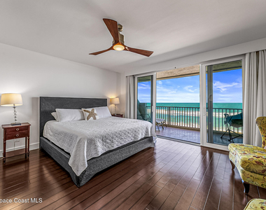 7415 Aquarina Beach Drive - Photo Thumbnail 25