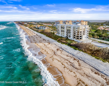 7415 Aquarina Beach Drive - Photo Thumbnail 74