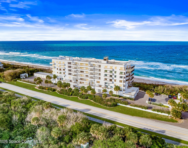 7415 Aquarina Beach Drive - Photo Thumbnail 2