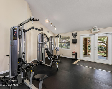 7415 Aquarina Beach Drive - Photo Thumbnail 64
