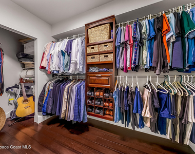 7415 Aquarina Beach Drive - Photo Thumbnail 40