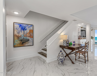 7415 Aquarina Beach Drive - Photo Thumbnail 6