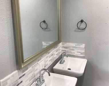 4989 S Ridgewood Avenue - Photo Thumbnail 5