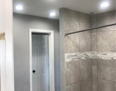 4989 S Ridgewood Avenue - Photo Thumbnail 2