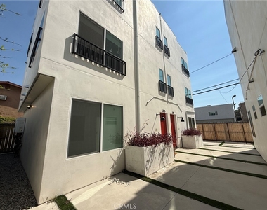 21715 Hart Street - Photo Thumbnail 1