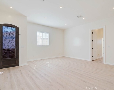 7947 Woodman Avenue - Photo Thumbnail 3