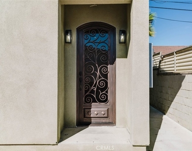 7947 Woodman Avenue - Photo Thumbnail 2