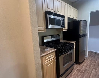 2418 Watermarke Place - Photo Thumbnail 4