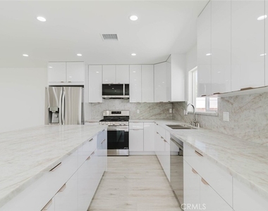 8310 Canterbury Avenue - Photo Thumbnail 2