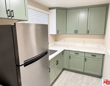 5966 1/2 Benner St - Photo Thumbnail 10