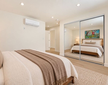 1070 1/2 E Masselin Avenue - Photo Thumbnail 4